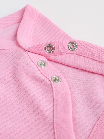 Next - Pijama entero/body en rosa