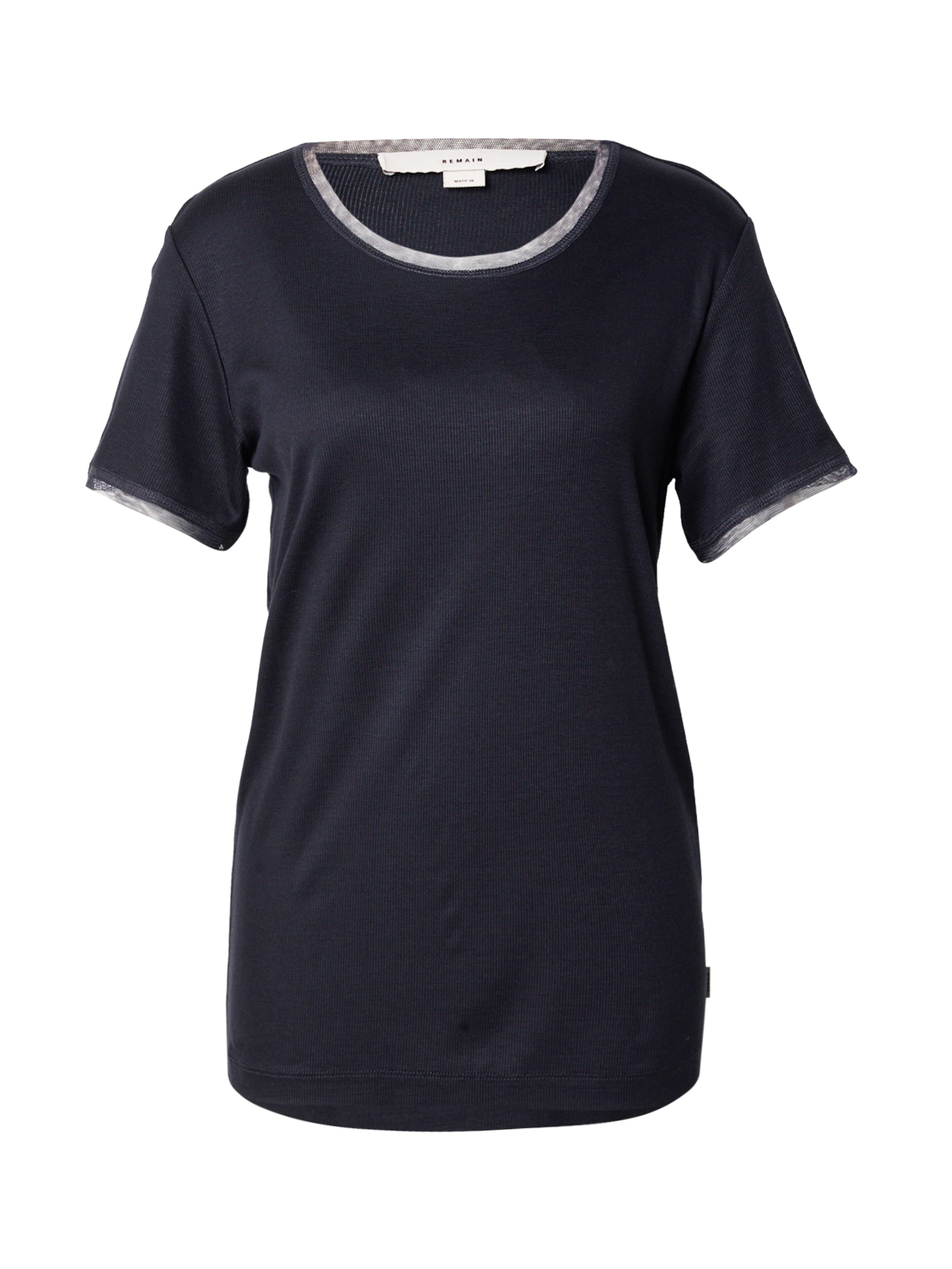 REMAIN Tričko - Sivá: predná strana