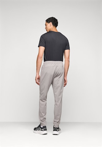 Tapered Pantaloni sport de la 4F pe gri