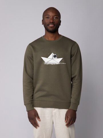 Watapparel Sweatshirt ' Astronaut in paper boat ' in Groen: voorkant