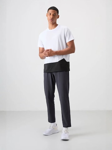 T-Shirt fonctionnel Tommy Life en blanc