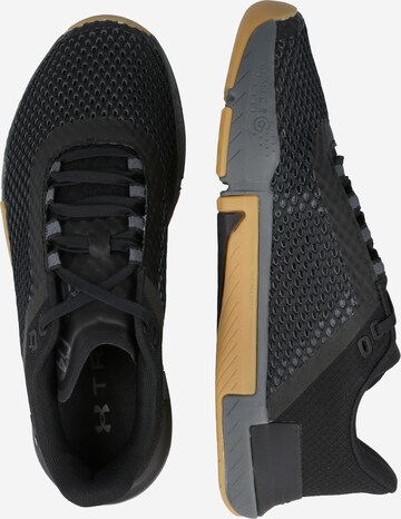 Chaussure de sport 'Tribase Reign 4' UNDER ARMOUR en noir