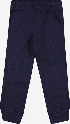 Tapered Pantaloni 'Club' de la Nike Sportswear pe albastru