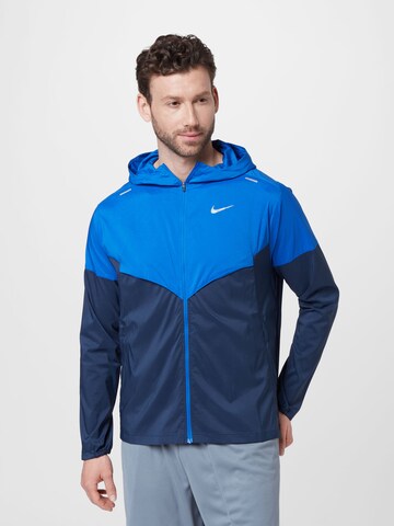 Giacca sportiva di NIKE in blu: frontale