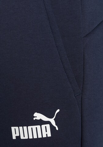 Effilé Pantalon de sport PUMA en bleu