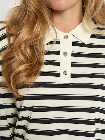 Top 'Marielle' di Peppercorn in beige