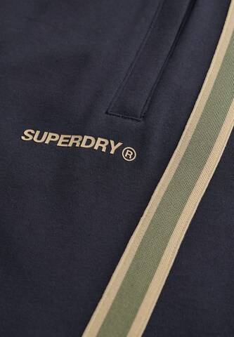 Superdry Tapered Broek in Blauw