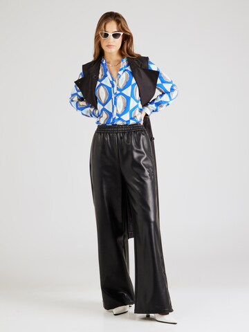 Emily Van Den Bergh - Blusa en azul