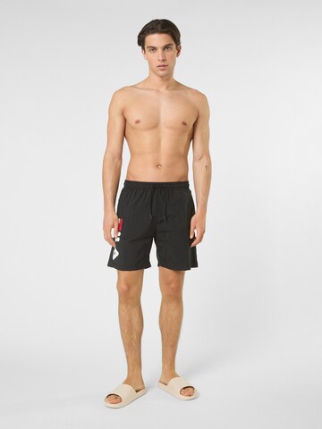 FILA Uimashortsit 'CARAVELLO regular logo beach shorts' värissä musta