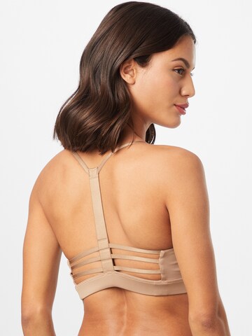 PUMA Bustier Sport-BH in Beige