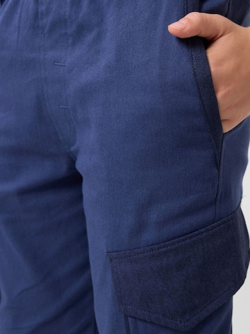 Pantalon 'TOMMY Kinder Cargo-Joggerhose' Tommy Life en bleu