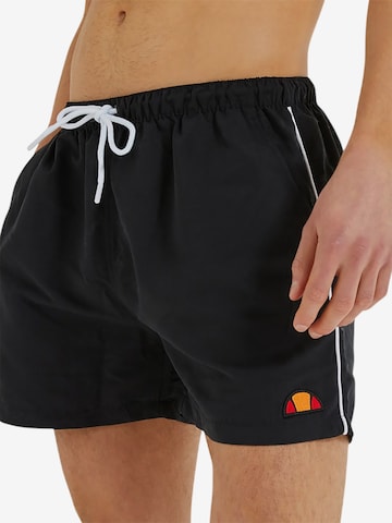 ELLESSE Board Shorts 'Dem Slackers' in Black: front
