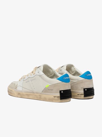 Sneaker bassa di Crime London in bianco