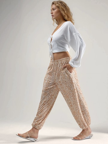 Hiccup Tapered Trousers in Beige