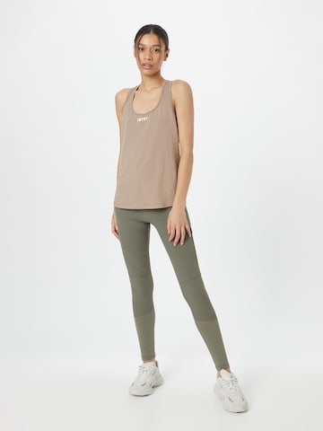 Skinny Pantaloni sportivi di aim'n in verde