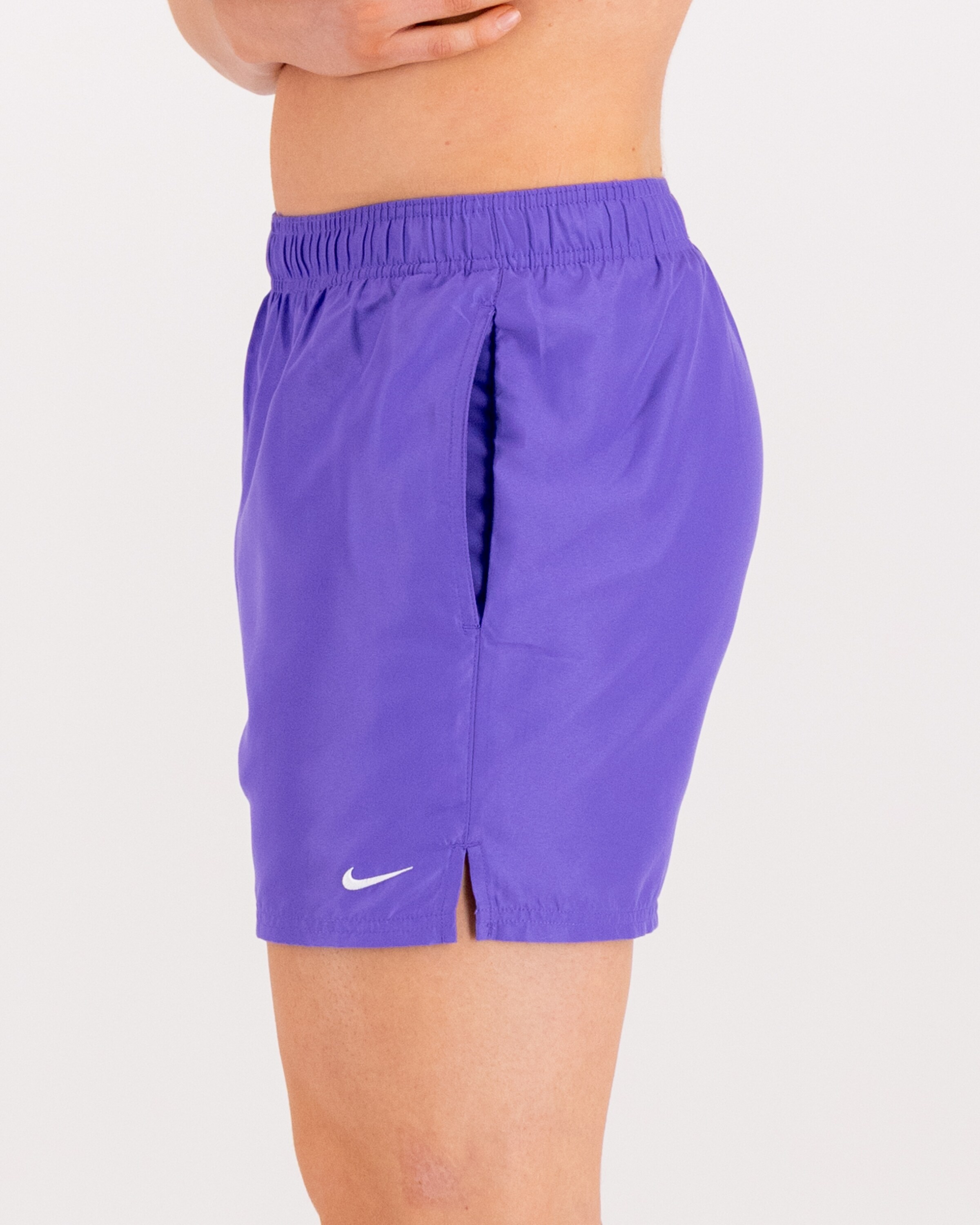 purple nike swim trunks