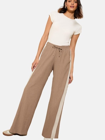 Wide leg Pantaloni di Friends Like These in marrone: frontale