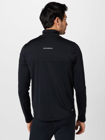 new balance - Camiseta funcional en negro