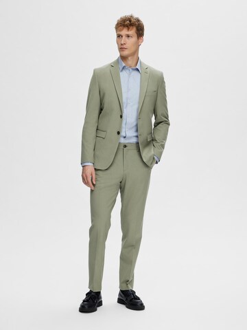 SELECTED HOMME Slim Fit Pikkutakki 'Liam' värissä vihreä