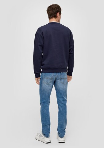 QS Slimfit Jeans i blå: baksida