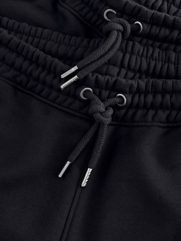 Tapered Pantaloni di Next in nero