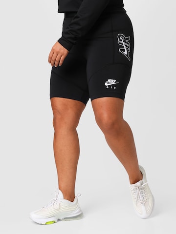 Nike Sportswear Leggings in Black: front