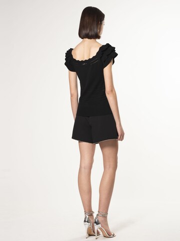 Influencer - Jersey en negro