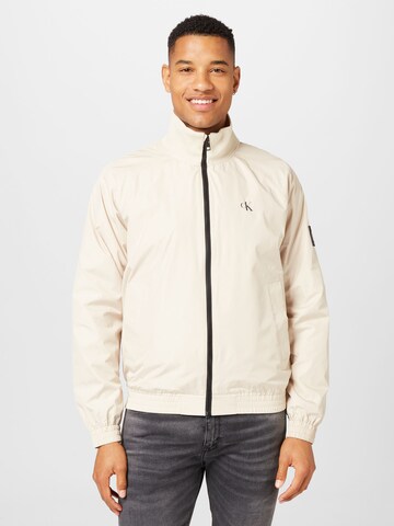 Calvin Klein Jeans Between-season jacket in Beige: front