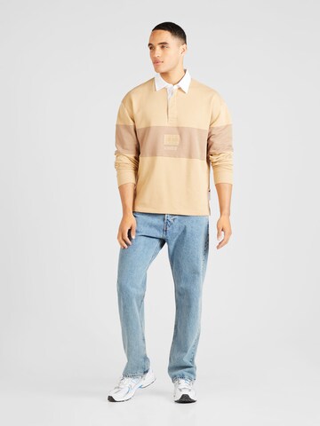 Tommy Jeans Collegepaita värissä beige