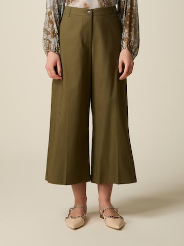 oltre Baggy Pants in Green: front