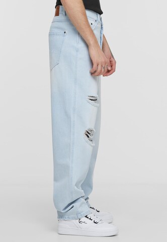 Tapered Jeans di Karl Kani in blu