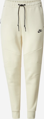 Nike Sportswear - Pantalón 'TCH FLC' en verde: frente