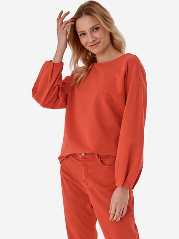 TATUUM Sweatshirt 'SUBMISA' i orange: framsida