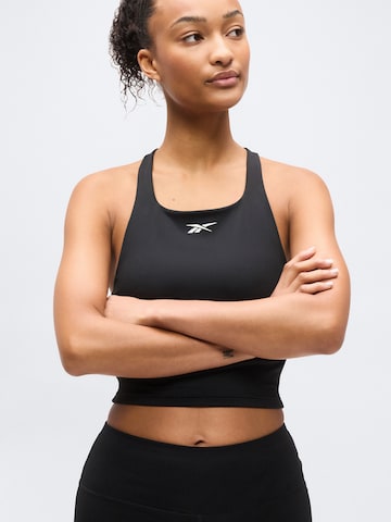 Reebok Skinny Sportbyxa 'ID TRAIN' i svart