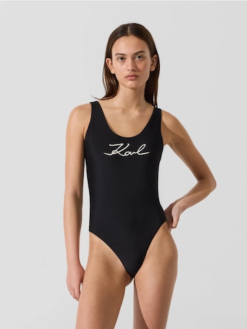 Costume intero di Karl Lagerfeld in nero: frontale