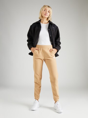 Effilé Pantalon de sport '100 Glacier Joggers' THE NORTH FACE en beige