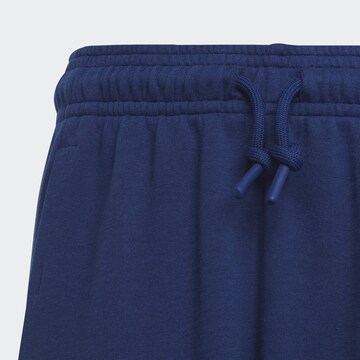 ADIDAS SPORTSWEAR Tapered Workout Pants 'Future Icons' in Blue