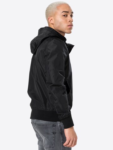 ALPHA INDUSTRIES Övergångsjacka i svart