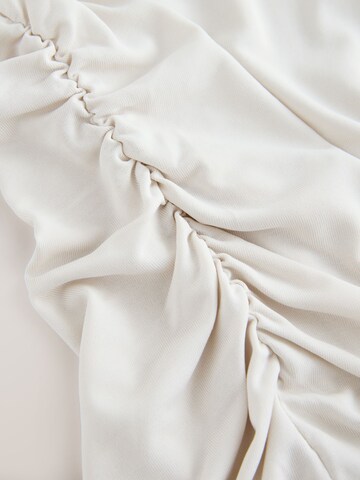 Next Funktionstopp i vit