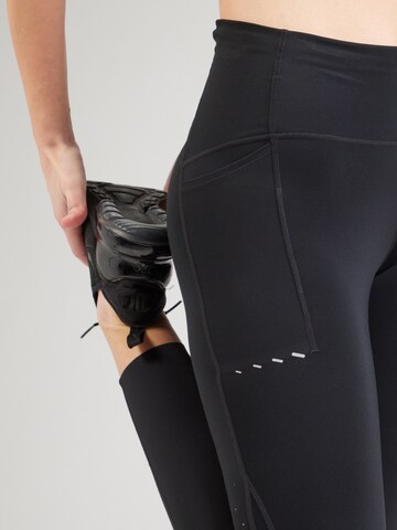 Skinny Pantaloni sportivi di NIKE in nero