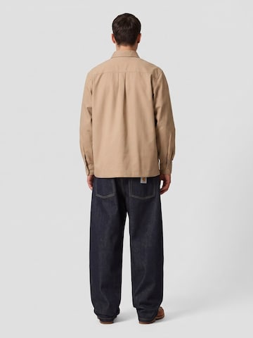 Carhartt WIP Baggy Jeans 'BRANDON' in Blauw