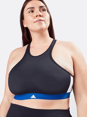 ADIDAS SPORTSWEAR Bustier Urheilurintaliivit 'VARSITY' värissä musta