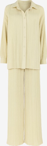 Elara Buksedragt i beige: forside