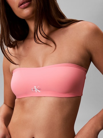 Bandeau Hauts de bikini Calvin Klein Swimwear en rose