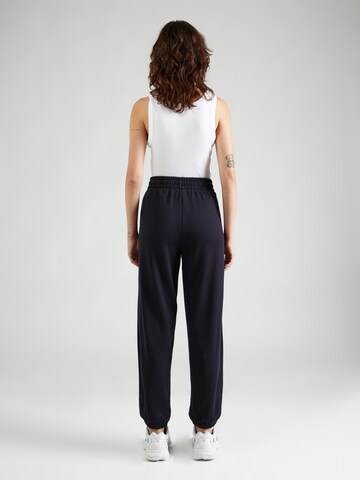 UNDER ARMOUR Tapered Sportbroek 'Rival' in Blauw
