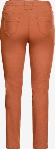 SHEEGO Slimfit Broek in Oranje