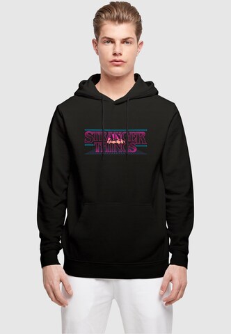 Sweat-shirt 'Stranger Things - Retro Title' ABSOLUTE CULT en noir : devant