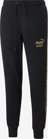 Effilé Pantalon de sport 'King' PUMA en noir : devant