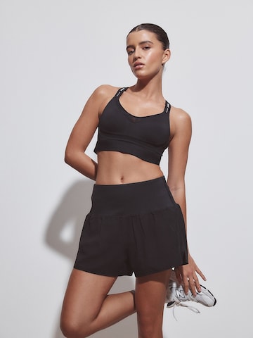 Loosefit Pantaloni sportivi di Next in nero
