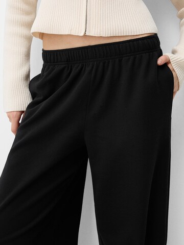 Bershka Wide leg Byxa i svart